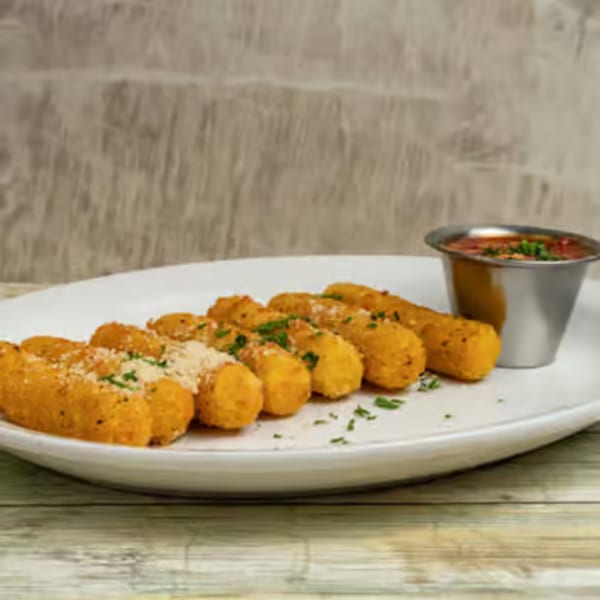 Golden mozzarella sticks, sprinkled with parmesan and parsley, served with a side of marinara sauce.