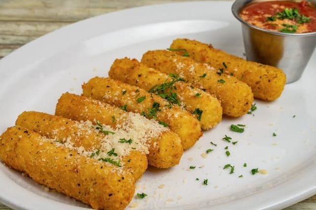Pan of Fried Mozzarella Sticks.